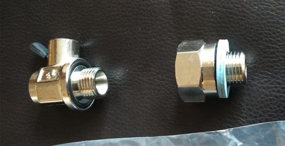 New DeLorean oil drain valve parts | DeLoreanDirectory.com
